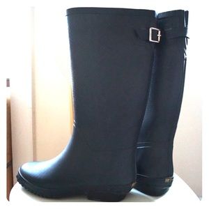 Black knee-high Tretorn rain boots